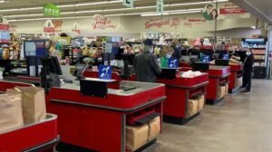 5 grocery store checkout lanes, all with hearing loops